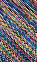 Multicolor chevron zigzag knit jersey fabric with vibrant stripes for apparel and crafts