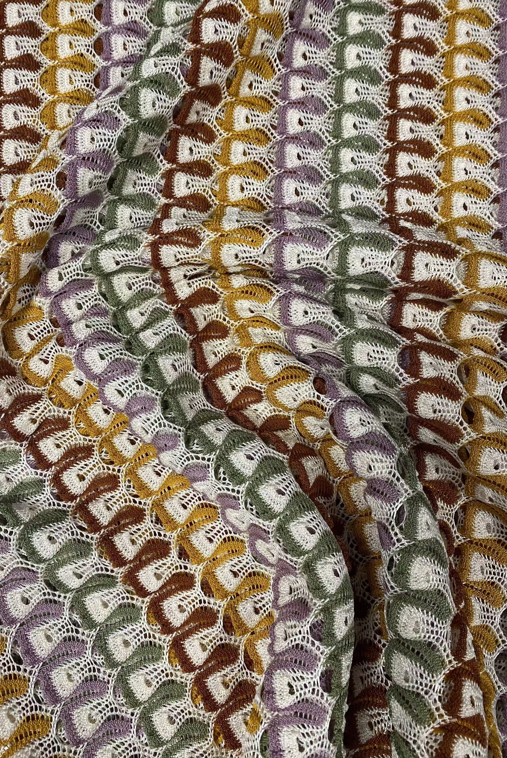 Soft color zigzag knit jersey mesh fabric with lightweight breathable texture for crafting and apparel projects
