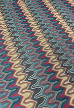 Luxury zigzag knit mesh fabric with multicolor wave pattern for elegant fashion and home decor projects