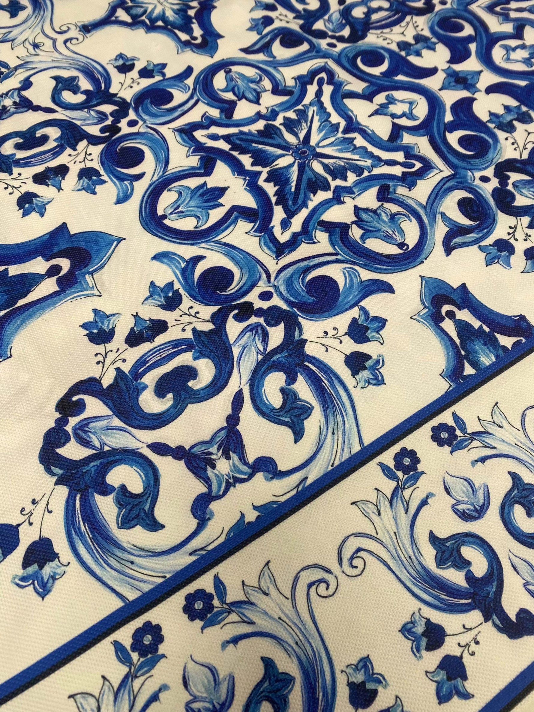 Mojalica Design Upholstery Fabric with elegant blue floral and geometric pattern on white background for home decor