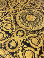 Barok Design Upholstery Fabric with intricate elegant gold floral patterns on black background for home décor
