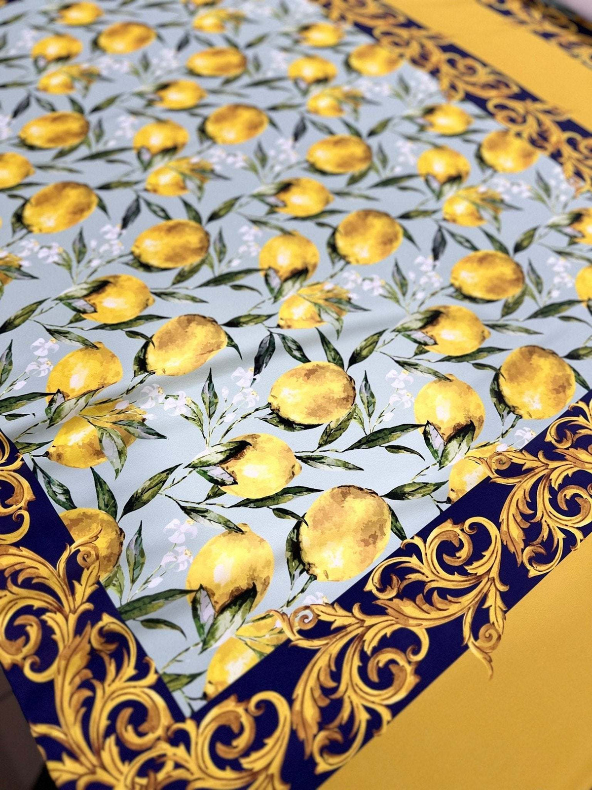 Baroque Lemon Fabric with Sicilian lemon pattern and decorative baroque border in yellow and navy blue