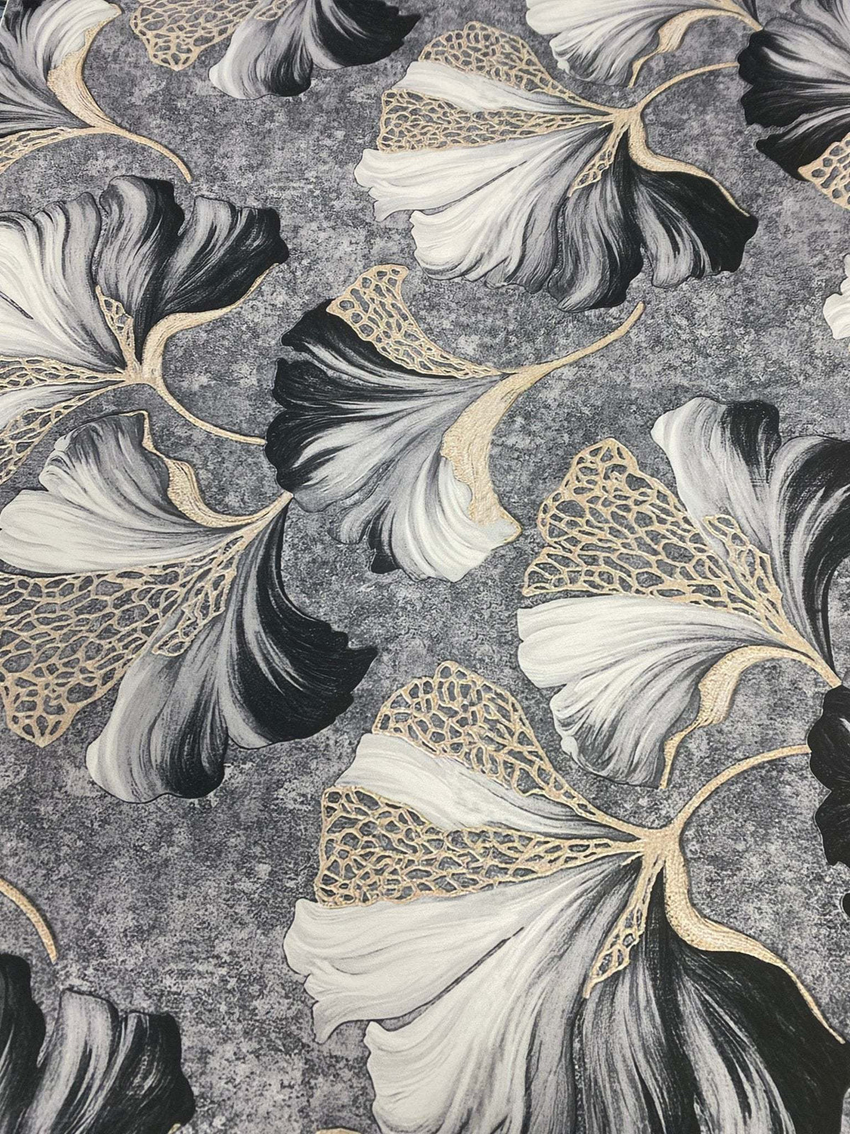 Black and white ginkgo leaf fabric with elegant gold vein botanical print on textured background