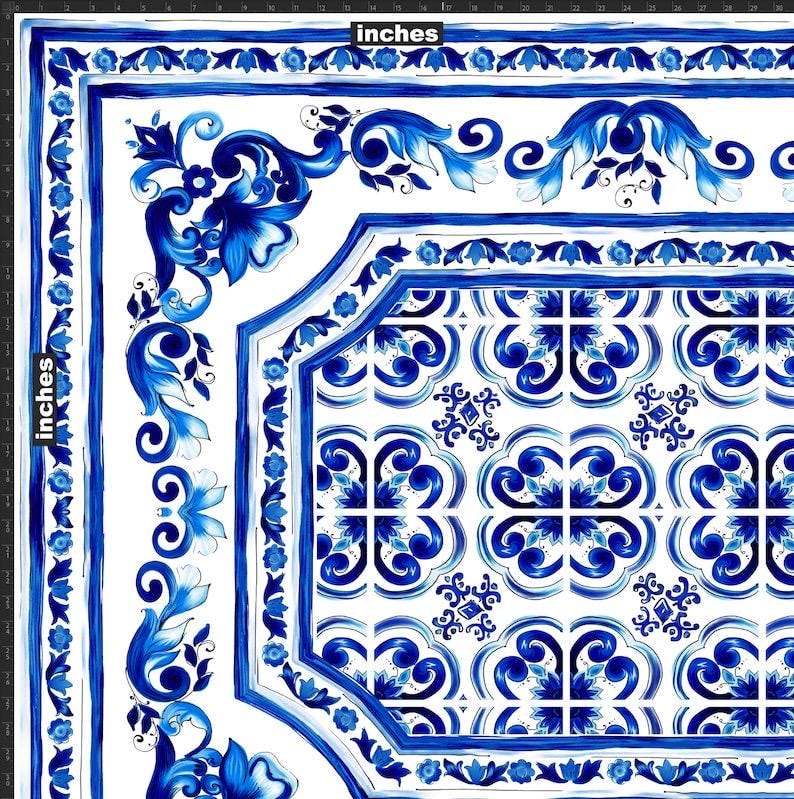 Blue Majolica silky crepe fabric with intricate blue floral and geometric patterns on white background, displayed with inch measurement scale