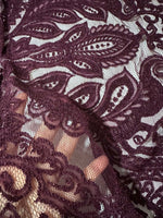 Bordeaux floral pattern lace fabric with intricate design and 150 cm width ideal for clothing and crafts