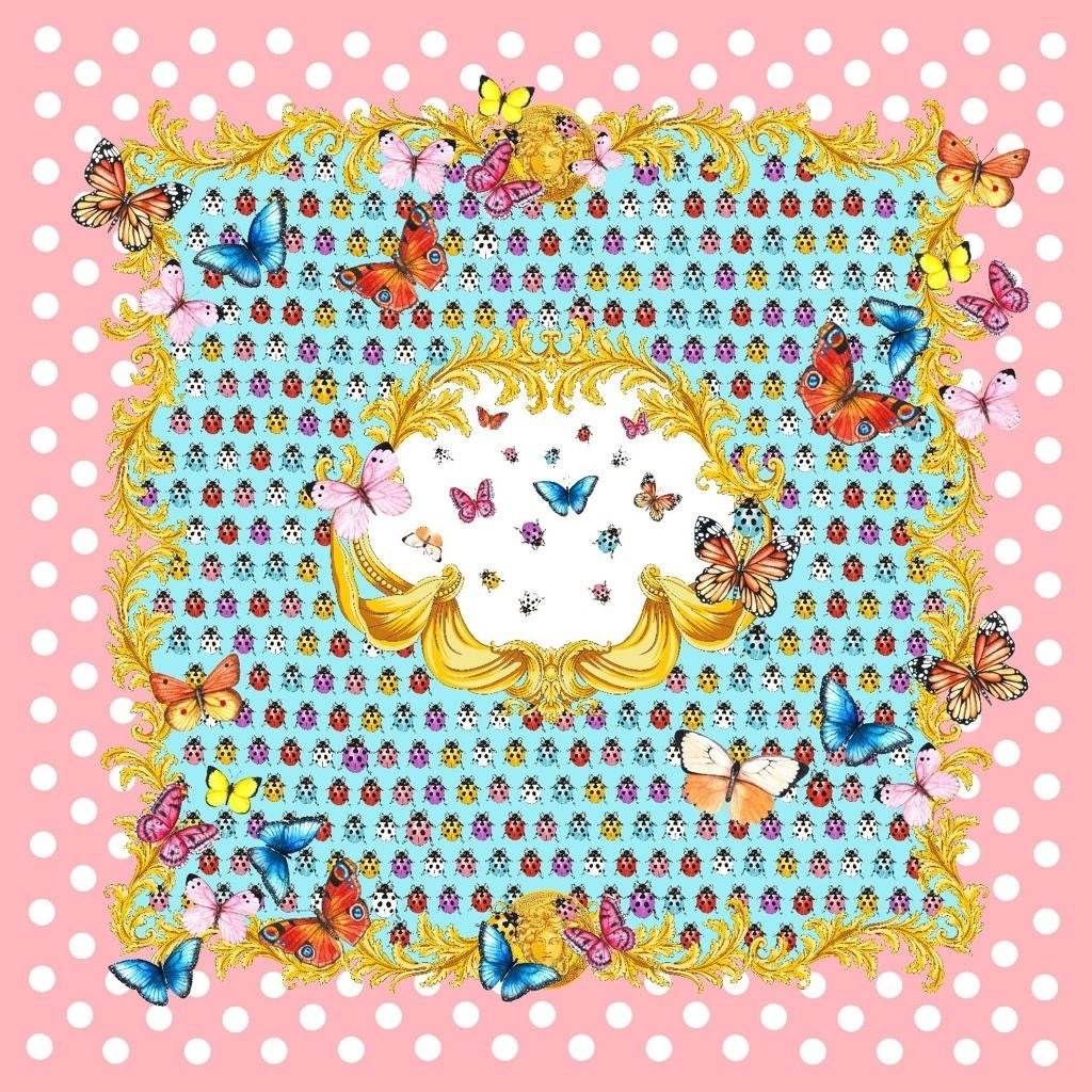 Colorful butterfly and ladybug pattern fabric with polka dot border and gold ornate frame on pink and blue background