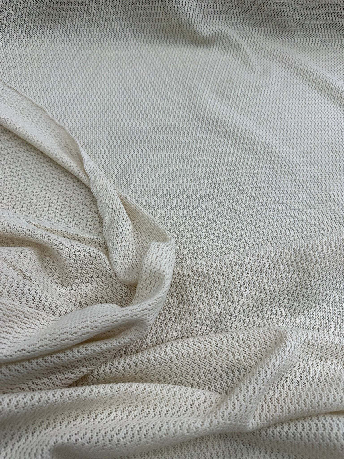 100 cotton off-white fishnet mesh fabric with breathable open weave for apparel and crafts