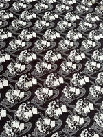 Black and white Greek crepe fabric with youth pattern featuring Rome design motifs