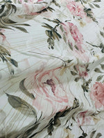 Lightweight chiffon fabric with gold striped floral print featuring pink roses and green leaves