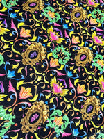Vibrant black fabric with colorful baroque floral and heart pattern for crafting and upholstery