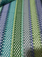 Striped knit mesh fabric with green and blue zigzag pattern for creative sewing projects