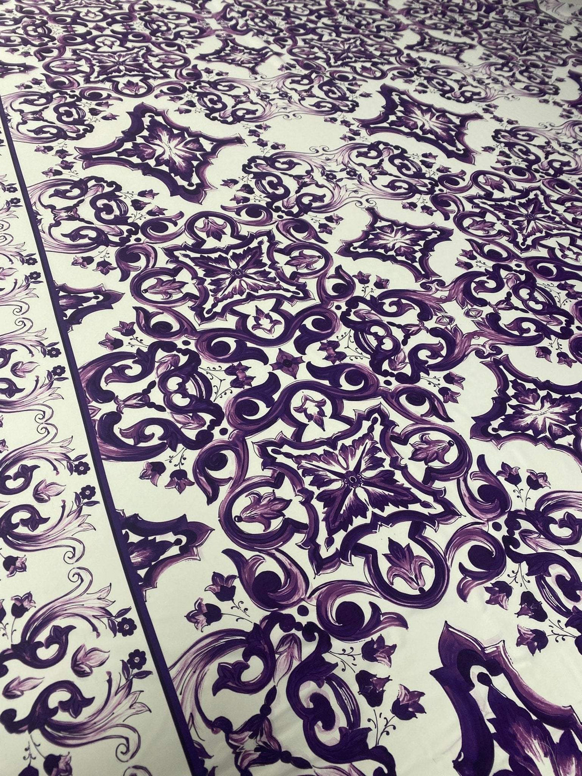 Purple Baroque floral pattern fabric with intricate elegant design in rich purple tones on white background, 150cm wide.