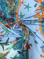 Baby blue fabric with colorful oyster shell and starfish sea life pattern, 150cm width sea shell design textile