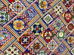 Sicilian Pattern Italian Fabric featuring vibrant, intricate geometric and floral designs in bold colors for fashion and home décor