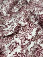 Brown wild forest pattern fabric with white background and animal motifs in Bordeaux shade, ideal for sewing and home decor projects