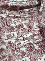 Brown wild forest pattern fabric with white animal illustrations and tree designs, 150cm wide textile for sewing projects and home decor.